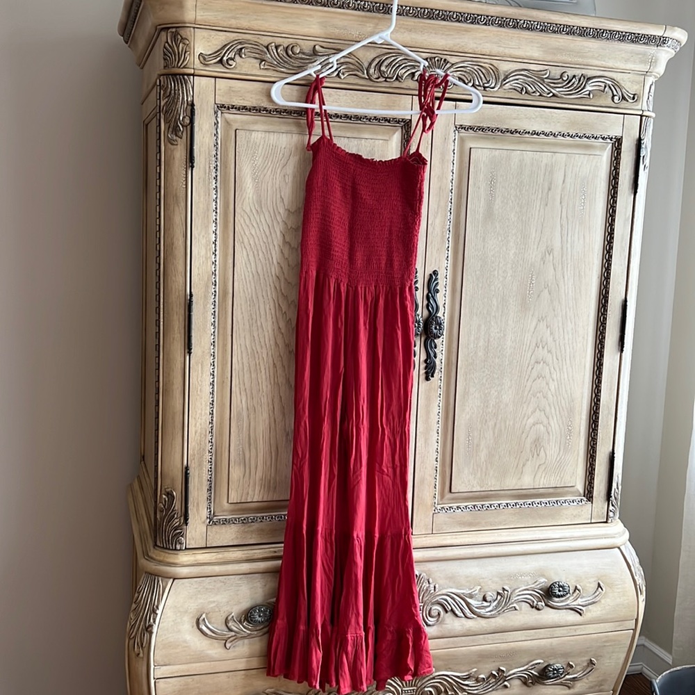 Orange /red jumpsuit with flares and ruffled bottoms
